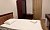 Одноместный номер эконом класса с 1,5 спальной кроватью, удобства на этаже
